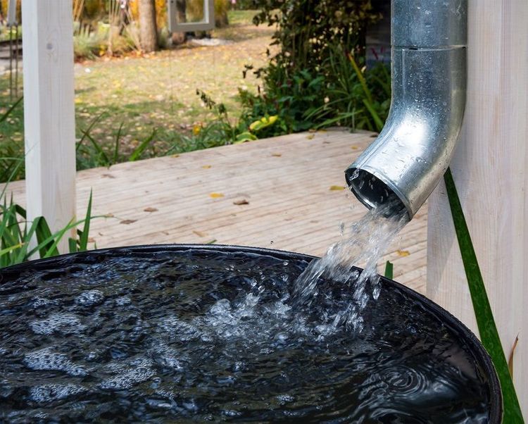 Two_rainwater_collection_tanks_with_overflow