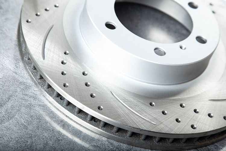 detailed_view_of_drilled_brake_rotor_with_polished_surface