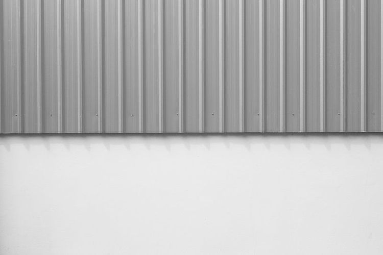 Corrugated_metal_panel_cladding_of_a_warehouse_building