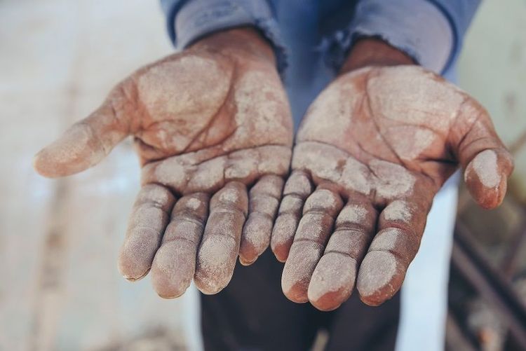 stained_palm_hand_with_cement_dust