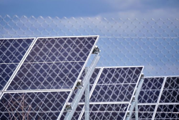 rows_of_solar_panels_on_reinforced_steel_structure