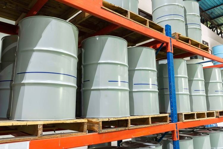 Industrial_storage_racks_holding_large_metal_drums_illustrating_the_use_of_steel_racking_systems_in_heavy_load_applications.